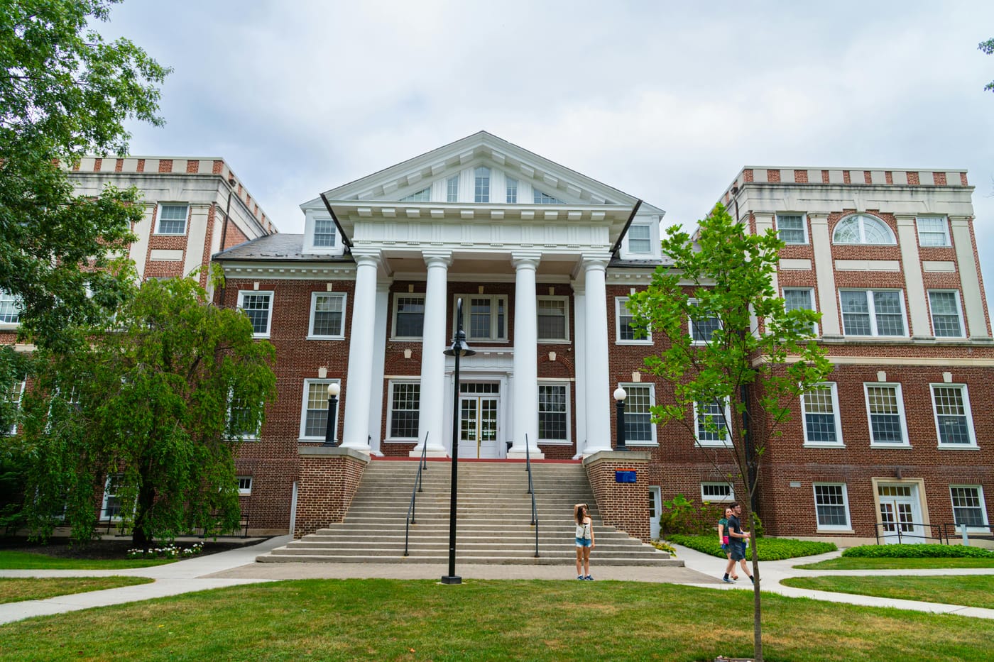 Classic academic building with white columns and brick facade at Gettysburg Pennsylvania campus representing university campus security