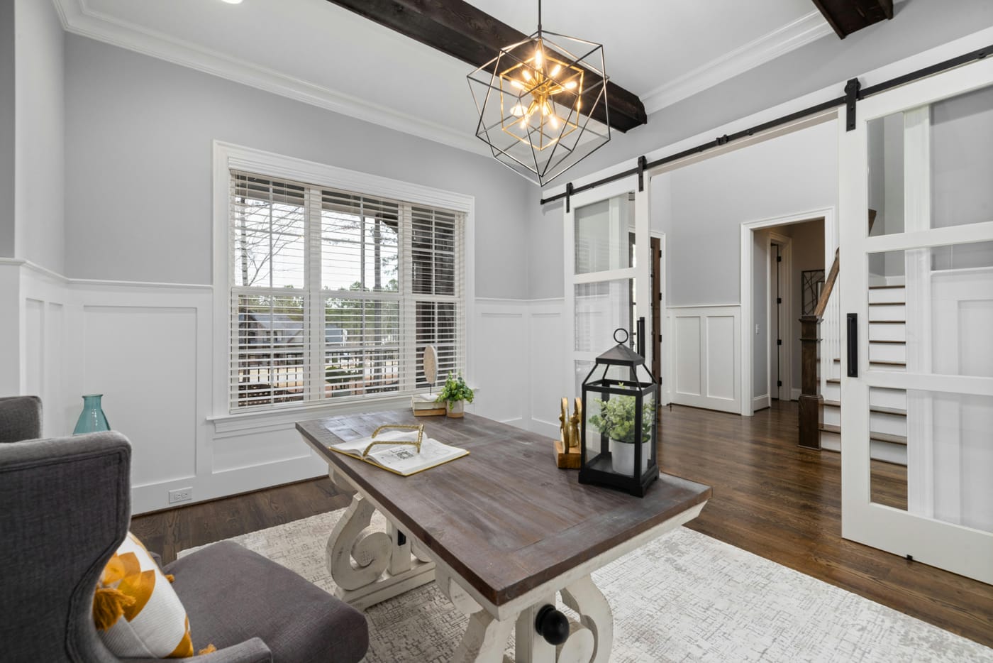 Sliding barn-style door in a bright living room
