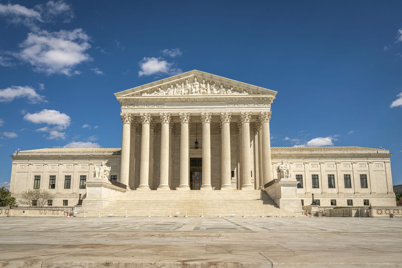 United States Supreme Court building beneath a blue sky