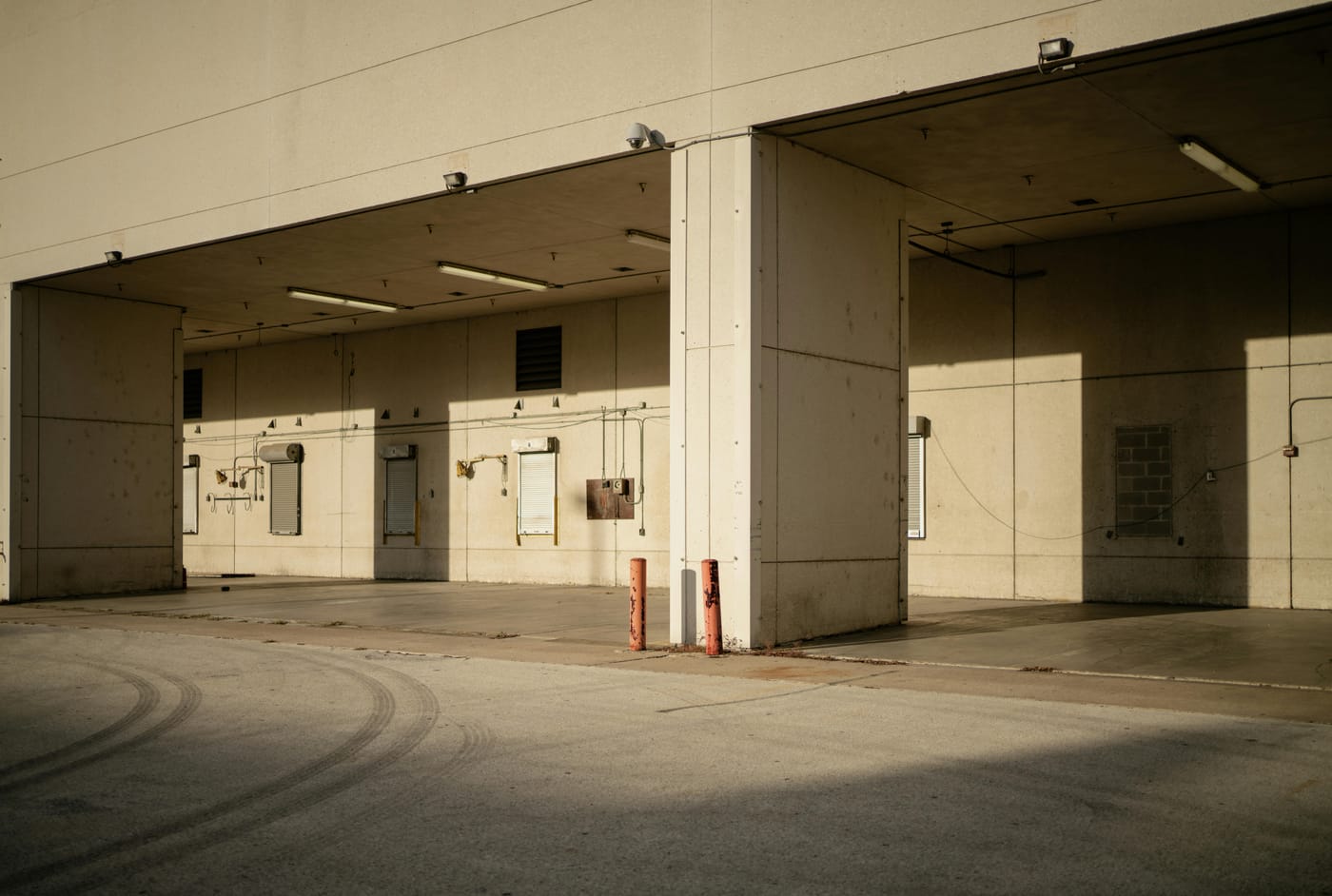 Large concrete vehicle bays in an industrial building