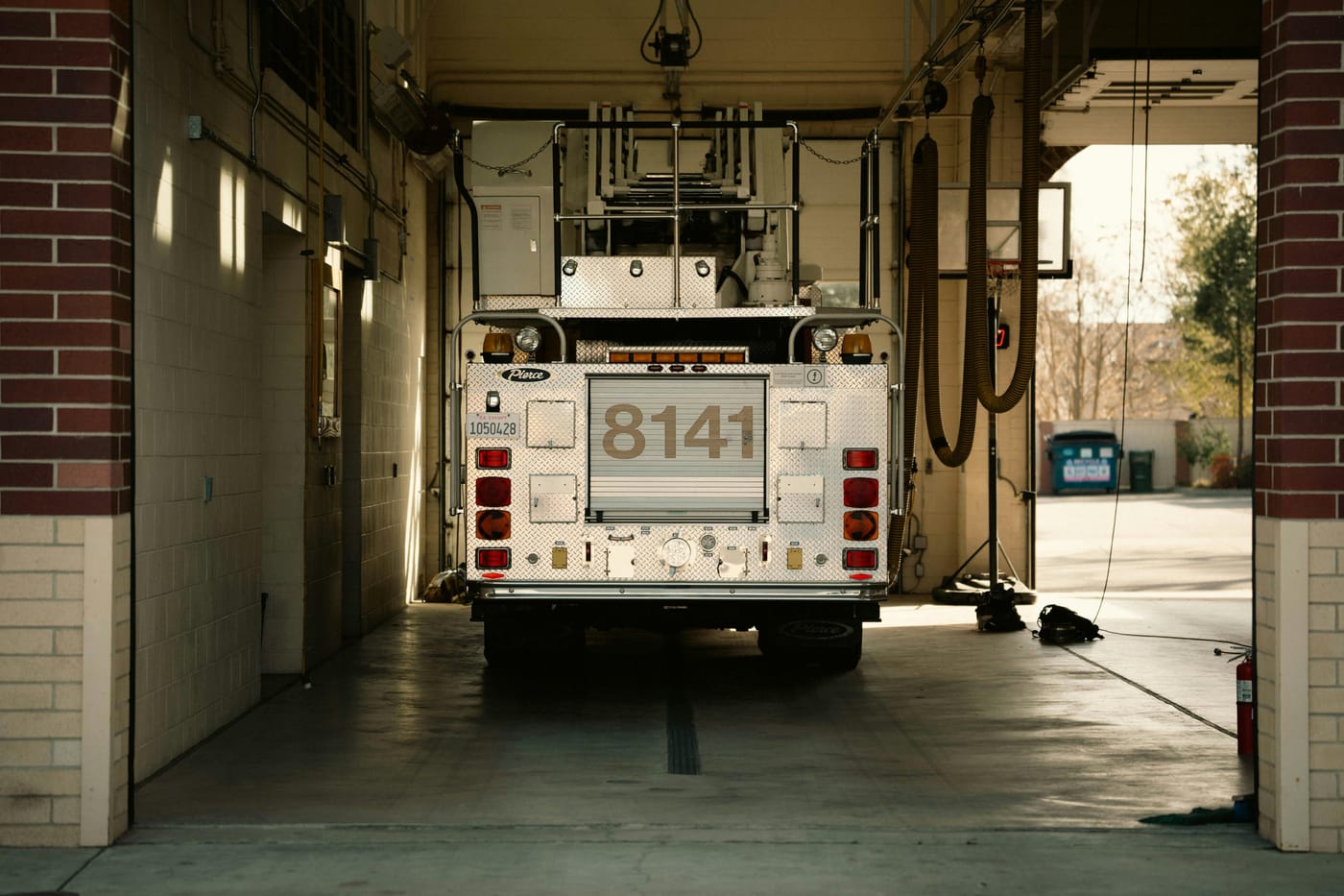 Fire truck parked inside an apparatus bay