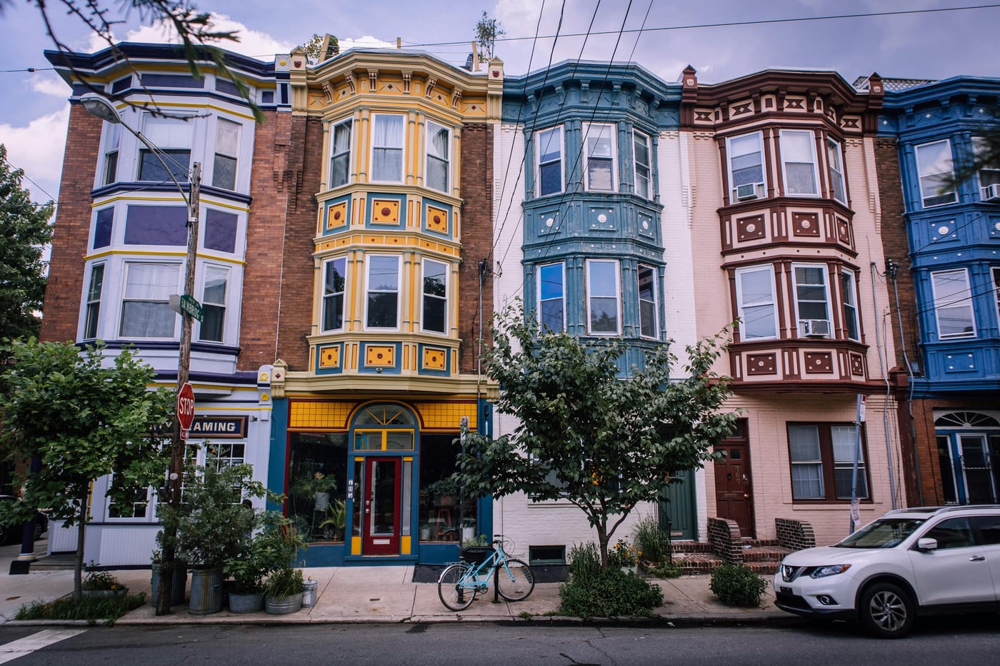 Colorful multistory houses along a residential street