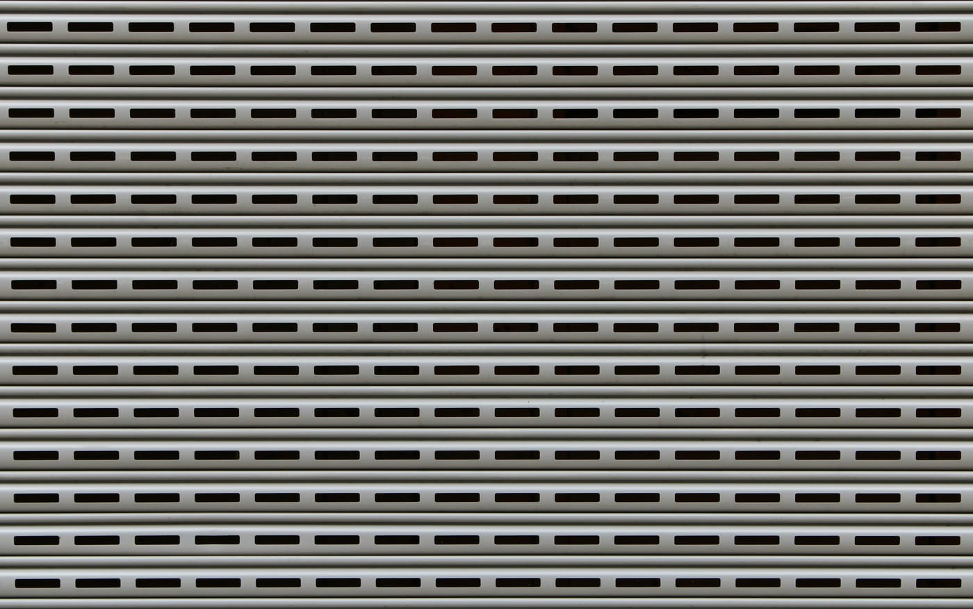 Perforated metal security shutter