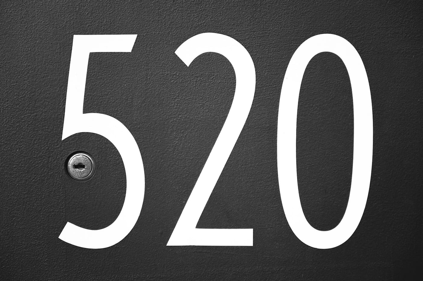 Door number 520 above a peephole
