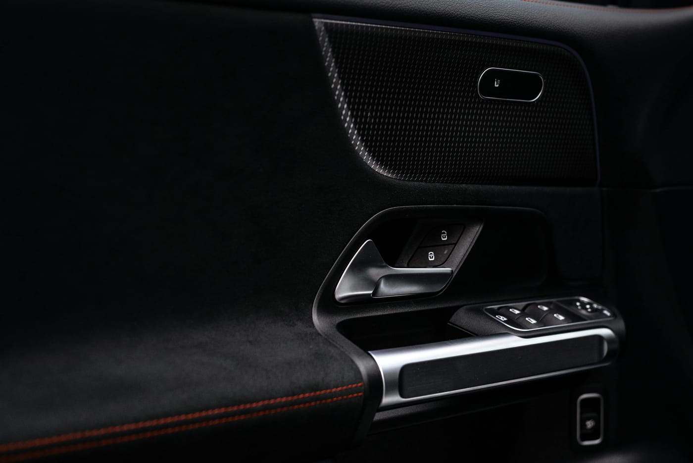Close-up of modern car door handle and electronic controls panel for vehicle lockout service in Washington DC
