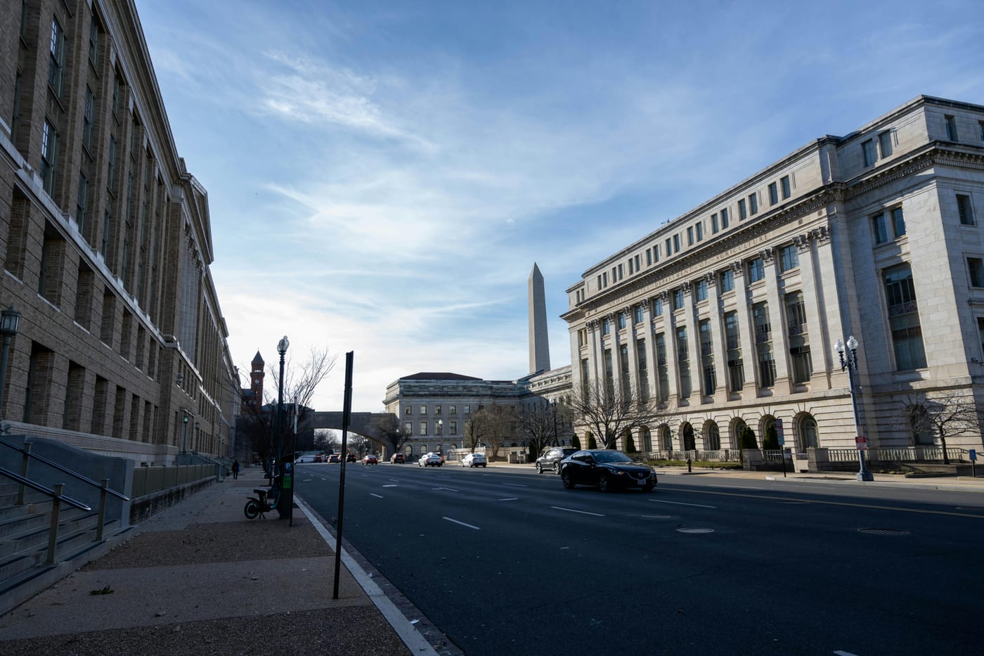 Washington DC street view with historic buildings and Washington Monument showing full locksmith coverage area