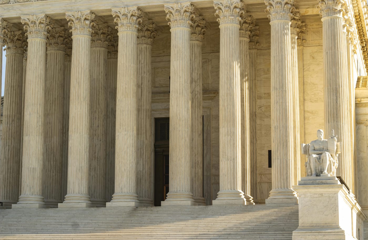 Columns and seated statue at the United States Supreme Court
