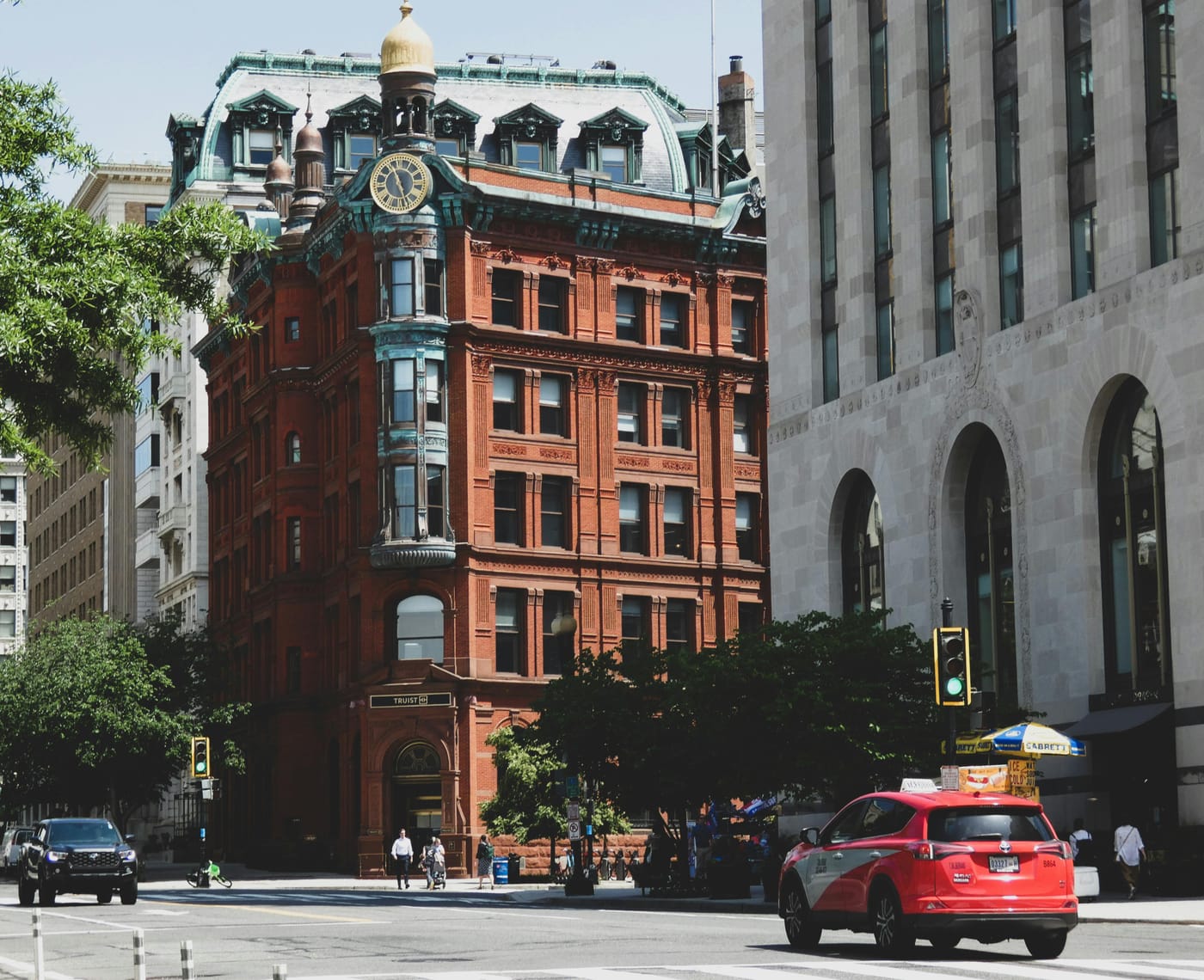 Ornate red brick building at a city intersection