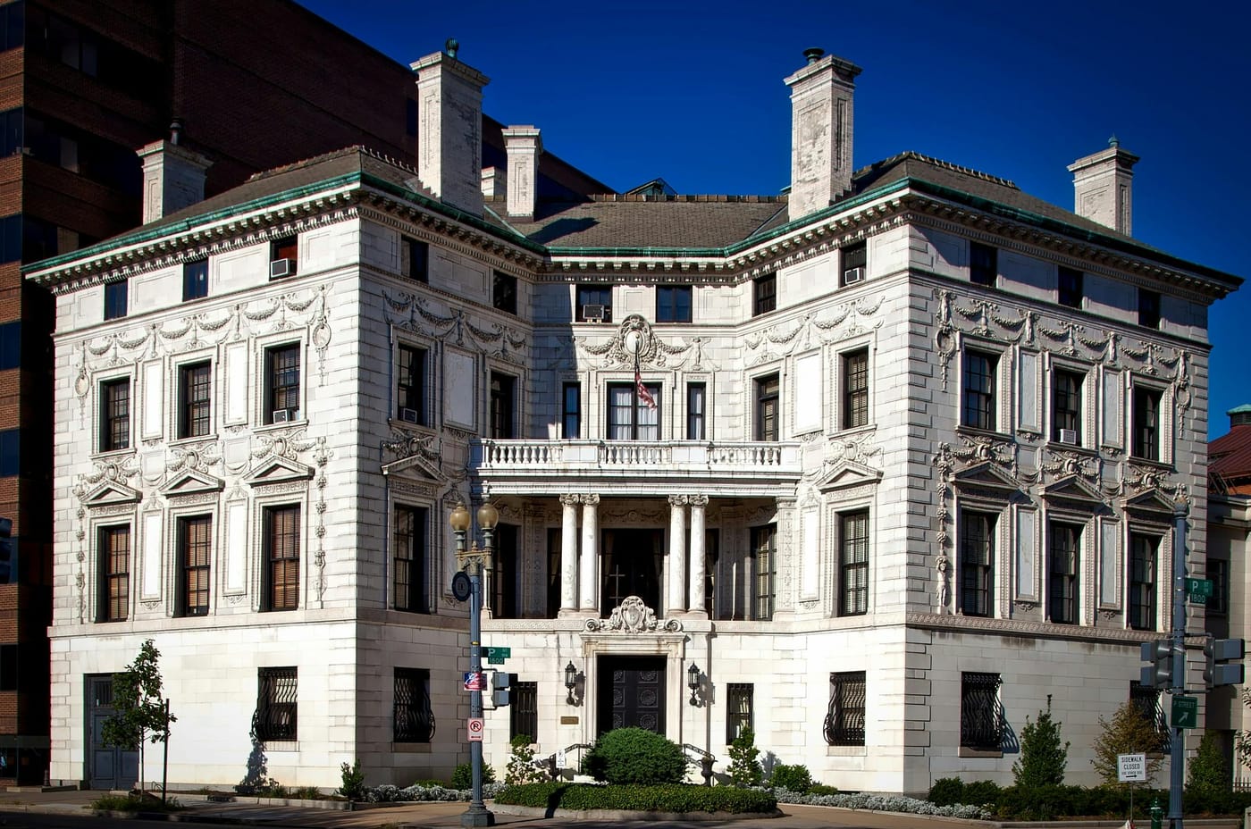 Large stone mansion with multiple chimneys