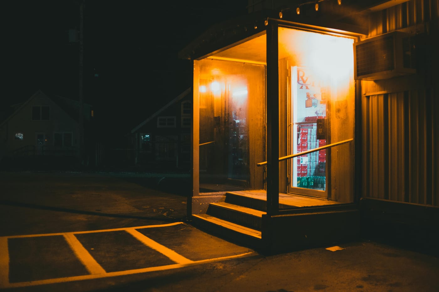 Small entrance building illuminated at night