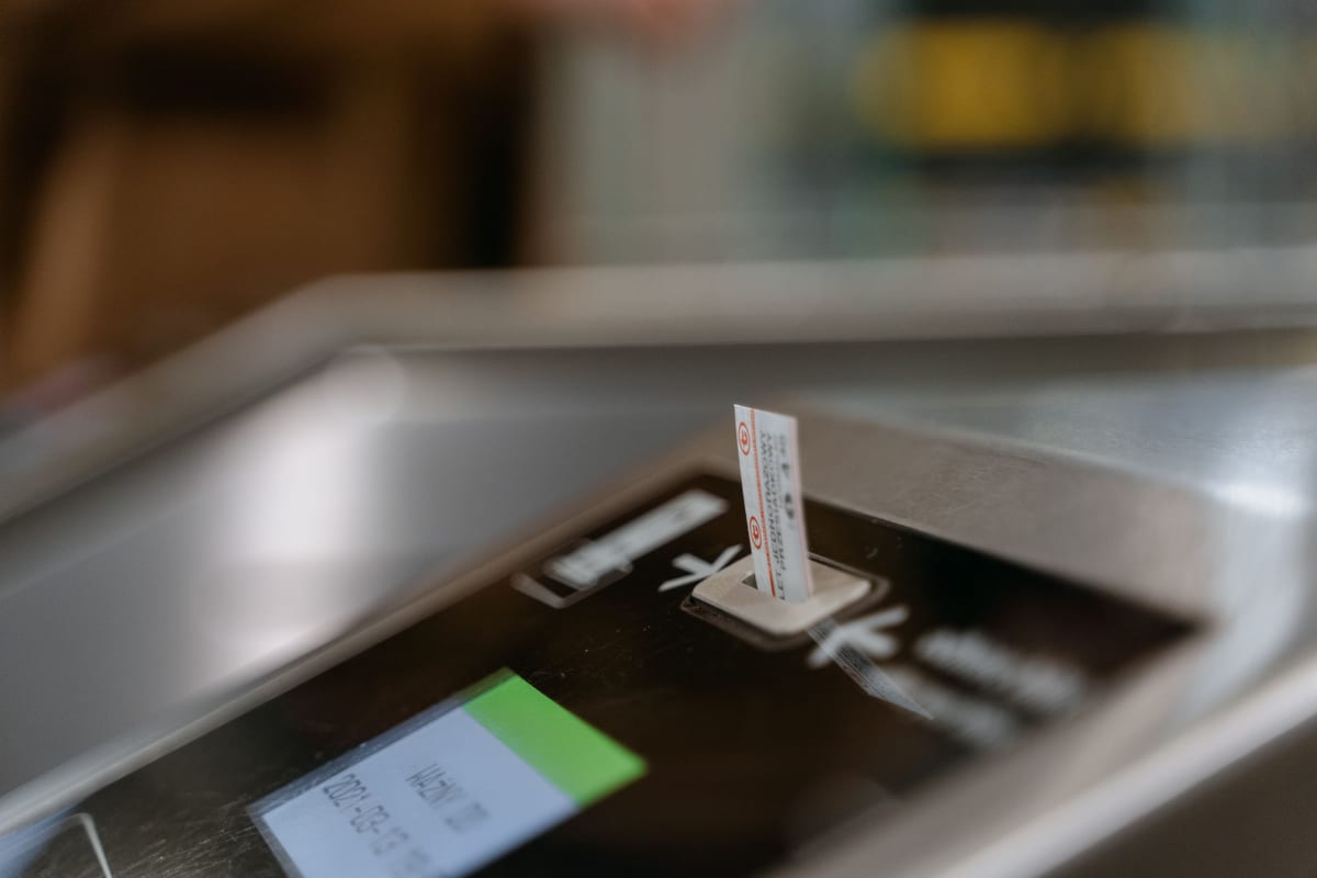 A PIV smart card access control reader being installed at a government office entrance