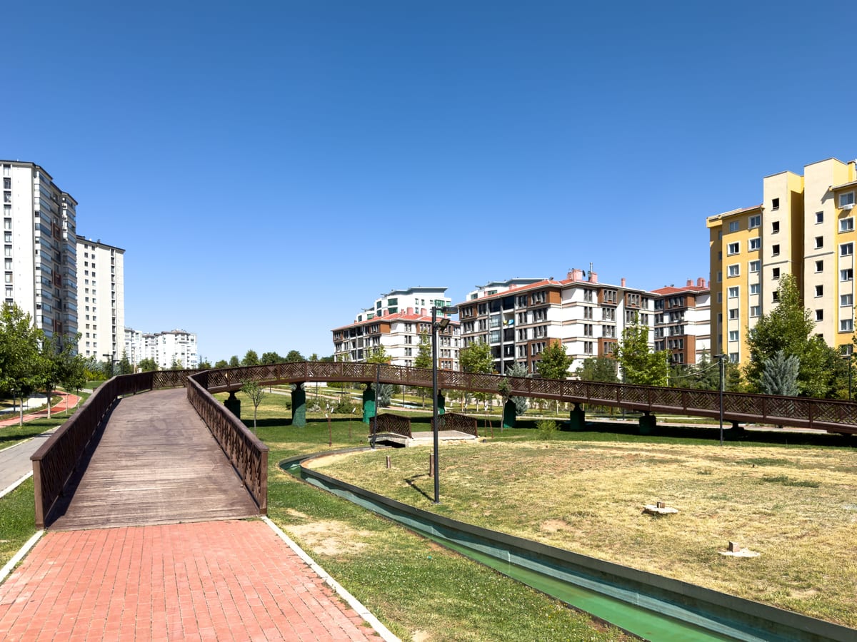 Townhouses surrounding a leafy city park