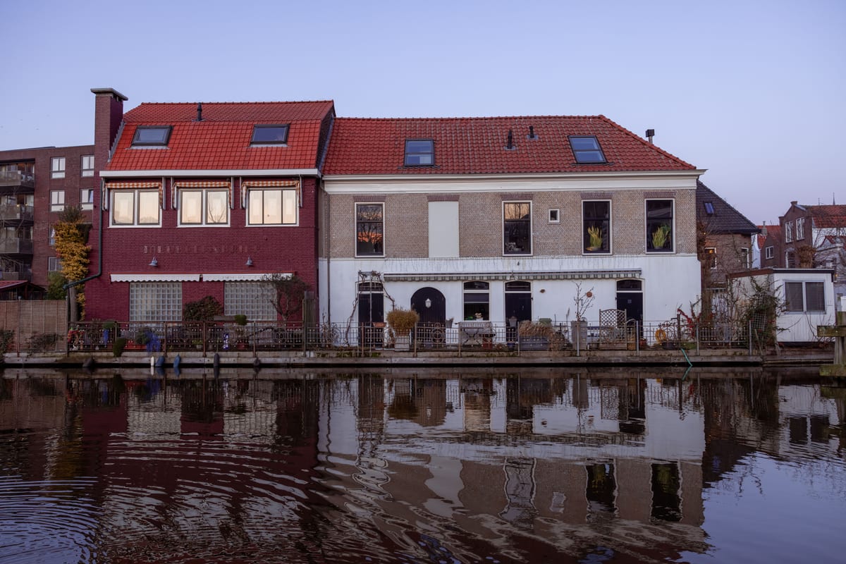 A row of townhouses in warm evening light