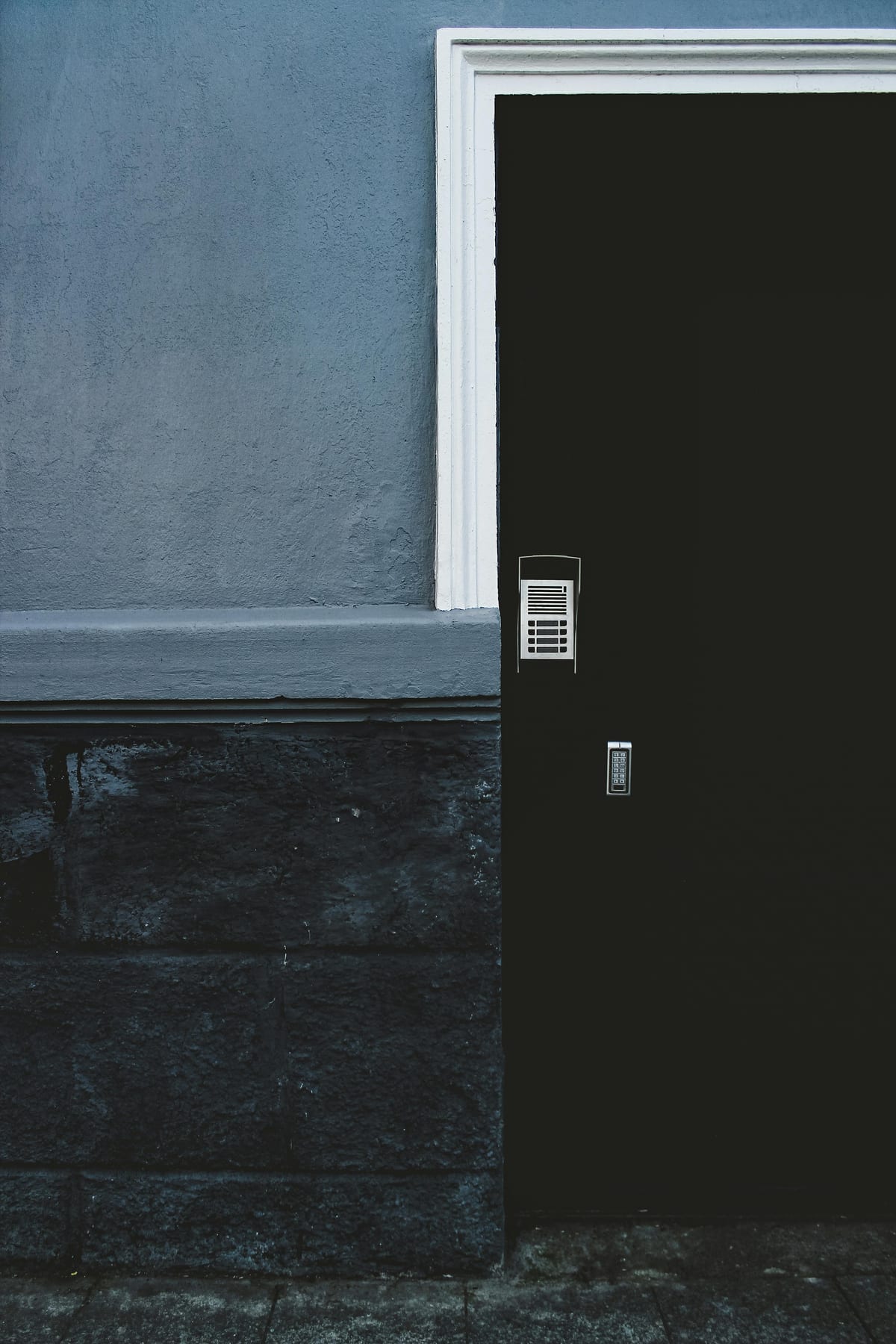 Smart keypad deadbolt on a residential door with electronic access
