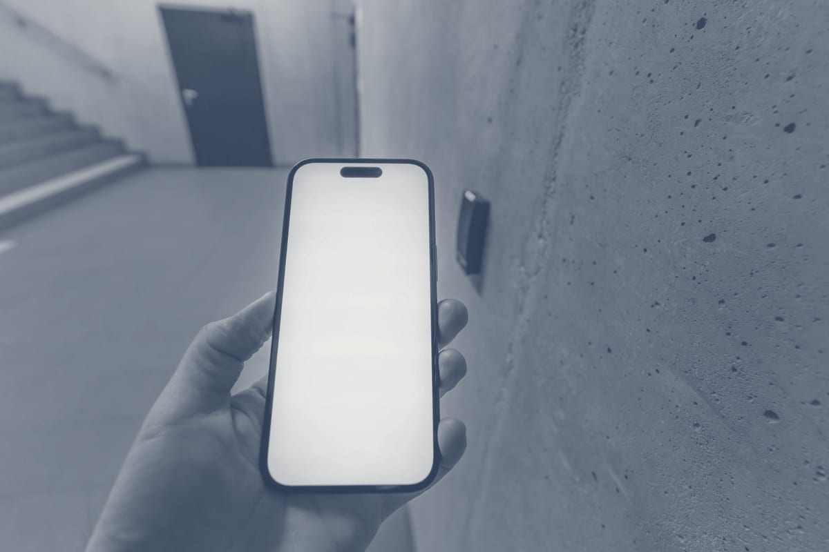 Smartphone using NFC technology to unlock a secure door